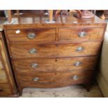 A Regency chest of two short and three long drawers on splayed feet
