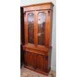 A mahogany two part cupboard bookcase