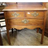 A George III mahogany three drawer lowboy