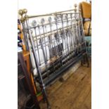 An antique style brass and iron 4'6" double bed frame