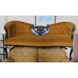 A Victorian mahogany framed two seater salon settee with gold velvet upholstery