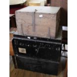 Two large metal storage trunks and a metal storage trunk