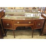 An Edwardian inlaid mahogany sideboard with brass metal work upstand