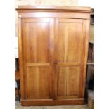 A 19th Century French walnut breakdown double wardrobe