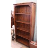 A dark stained hardwood bookcase