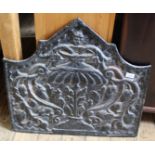 An 18th Century cast iron fire place back plate