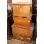 Four Edwardian pine storage boxes of graduated sizes