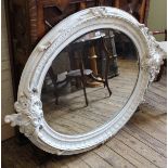 A modern large French style white painted bevelled glass oval mirror