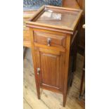 An Edwardian style mahogany pot cupboard with single drawer with glass tray top