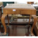 A Victorian tapestry top stool on cabriole legs