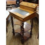 A Victorian inlaid walnut and mahogany small two tier desk