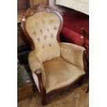 A Victorian mahogany style balloon back chair with gold button back upholstery