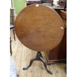 A Victorian mahogany tilt top tripod table