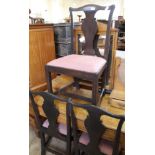 A set of six stained mahogany dining chairs