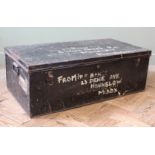 A vintage military style tin trunk