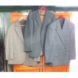 A mixed lot of men's clothing including jackets,