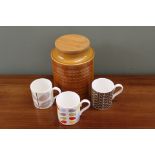 Three Orla Kiely bone china mugs and a Hornsea flour jar