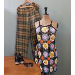 A brand new 1970's style crochet dress, a pair of 1940's style wide leg tartan trousers,