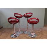 Four chrome and red bar stools (one as found)