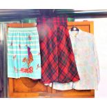 A mixed lot of lady's clothes including skirts,