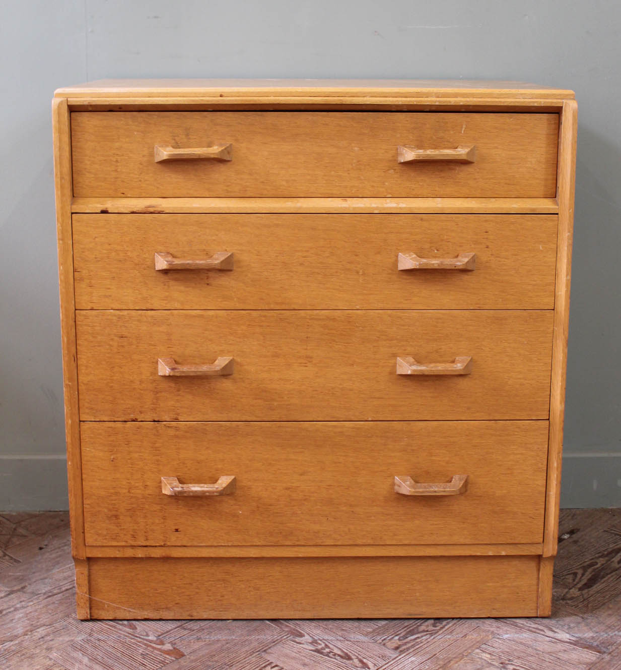 A light oak vintage G Plan chest of four drawers with EG stamp for Ernest Gomme