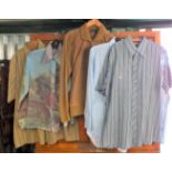 A mixed lot of men's clothes including shirts,