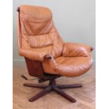 A vintage Swedish Mobel swivel armchair in tan leather