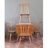 Set of three Ercol light blond elm and beech candlestick dining chairs plus one other hoop back