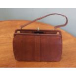 A vintage Mappin and Webb Ltd lizard skin handbag