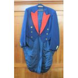 A vintage hunting jacket with tails and red lapels