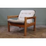 A 1960's Danish style reclining lounge chair with teak frame