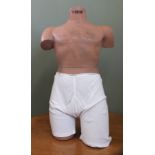 A 1950's table top male mannequin advertising Y-Fronts