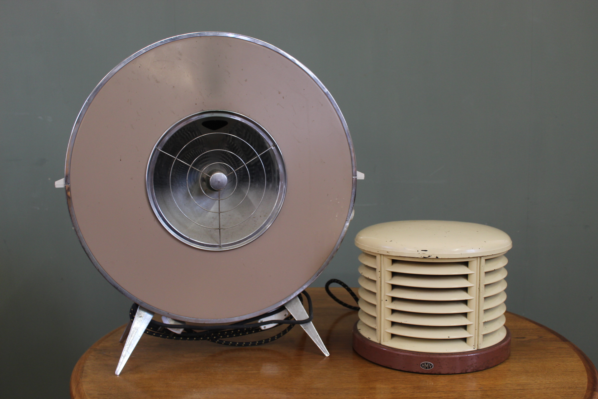 A circular heater and one other vintage heater (both sold as collector's items only)