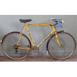 A 1970's yellow men's Puch racing bicycle