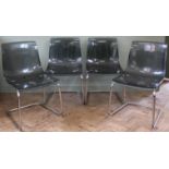 Four contemporary smokey black Perspex and chrome chairs