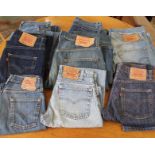 Ten pairs of various styles of vintage Levis jeans and sizes 28" - 32" waist