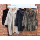 Four fake fur coats