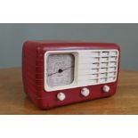 A vintage red Ultra transistor radio