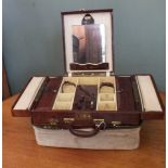 A vintage dressing case marked Marie Earle