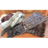 A collection of fur wraps and stoles