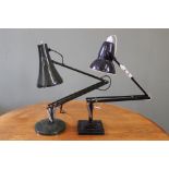 An vintage black anglepoise lamp with square base and one other anglepoise in dark green (sold as