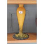 A French Art glass vase, yellow and blue mottled with exaggerated base,