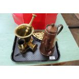 An 18th Century brass pestle and mortar plus other brass and copper ware