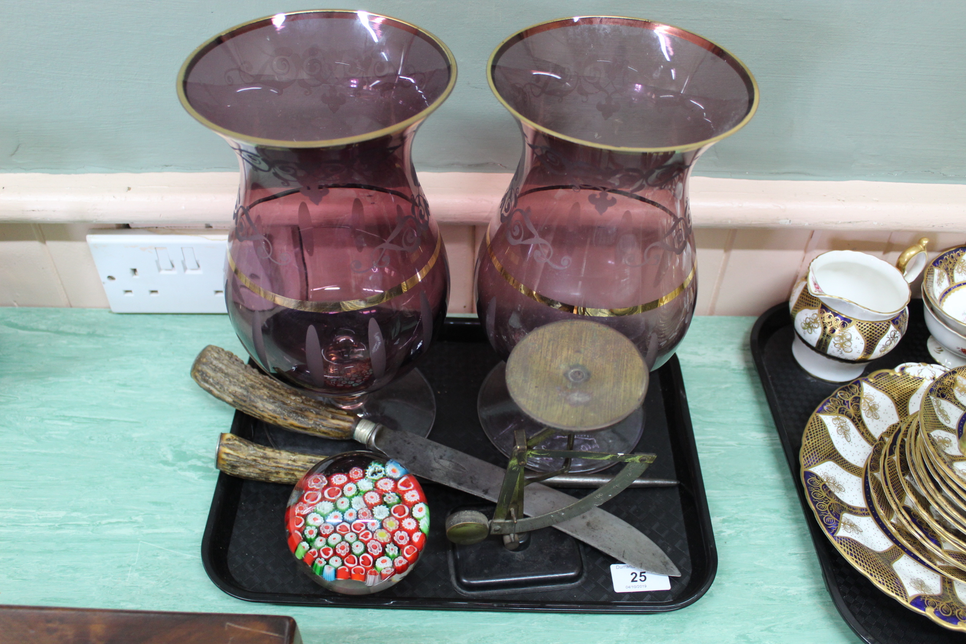 A pair of mauve and gilt glass vases, signed plus postal scales,