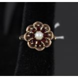 A 9ct gold garnet and pearl floral cluster ring,