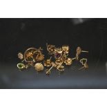 A collection of 9ct gold and yellow metal earrings (condition varies,