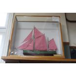 A cased model of Thames sailing barge