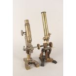 Two brass microscopes,