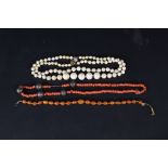 A string of graduating ivory beads with later 9ct gold clasp,