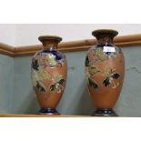 A pair of Royal Doulton Slaters brown ground glazed floral vases,